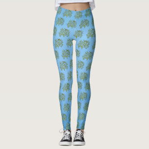 Green watercolor coral tree on blue leggings