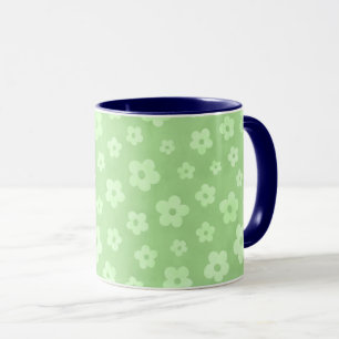 Green & white flowers tea cup with blue handle