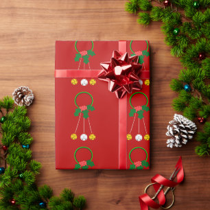 Green Wreath With Holly on Red Wrapping Paper