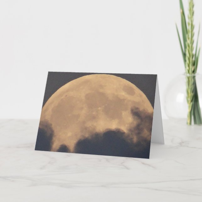 Greeting card supermoon in grey clouds (Front)