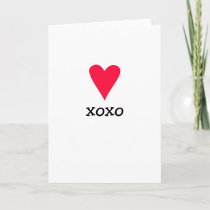 Greeting card with a red heart and xoxo for love
