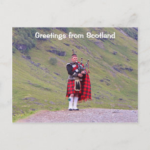 Greetings from Scotland: Lone Scottish bagpiper Postcard