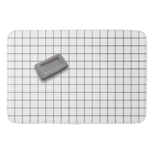 Greige Bar Soap on a White Tile Floor Bath Mat