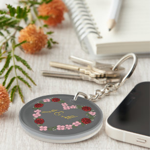 Grey acrylic keychain with pink and red heart