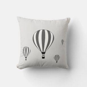Grey and white hot air balloons on silver cushion