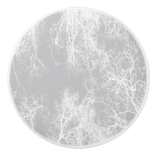 Grey and white silhouetted trees ceramic knob