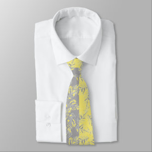 Grey and yellow leaves on a striped background. tie