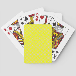 grey arabesque on yellow playing cards