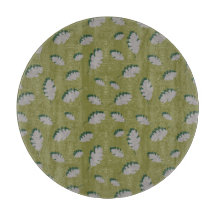 Grey autumn leaves pattern on a green background