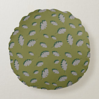 Grey autumn leaves pattern on a green background round cushion