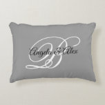 Grey Black and White Fancy Wedding Monogram Decorative Cushion<br><div class="desc">A couple's monogram with a fancy calligraphy script in black and white against a grey solid colour background. 
You can customise the colours in this typography design or the fancy and elegant calligraphy styles. 
An accent pillow wedding gift for the newly weds. 
Black,  white and grey home decor.</div>