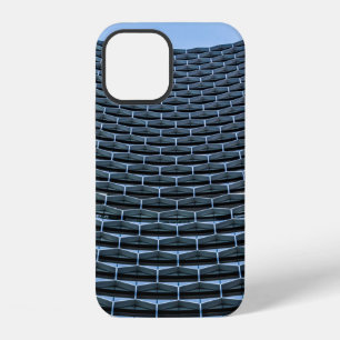 Grey building under clear blue sky iPhone 12 case
