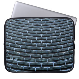 Grey building under clear blue sky laptop sleeve