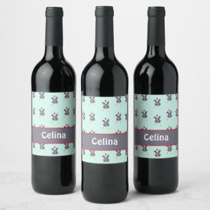 Grey bunnies on blue wine label