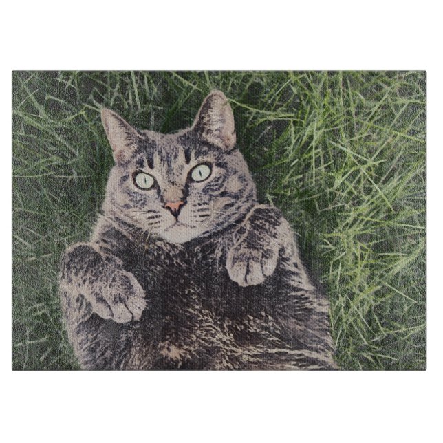 grey cat lying in the grass digital art cutting board (Front)