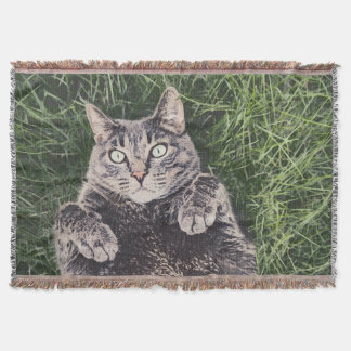 grey cat lying in the grass digital art throw blanket