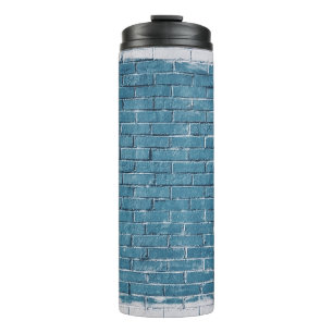 Grey concrete bricks painted in blue thermal tumbler
