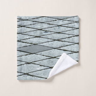 Grey concrete pavement wash cloth