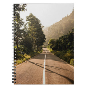 Grey concrete road in the morning notebook