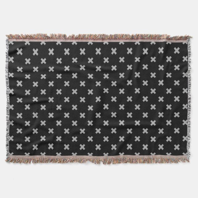 Grey cross stitches on black throw blanket (Front)