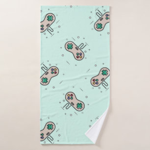 Grey game joystick on blue bath towel