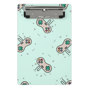 Grey game joystick on blue mini clipboard