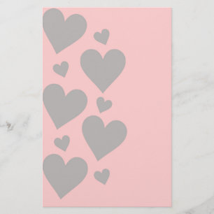 Grey hearts on a pink background stationery