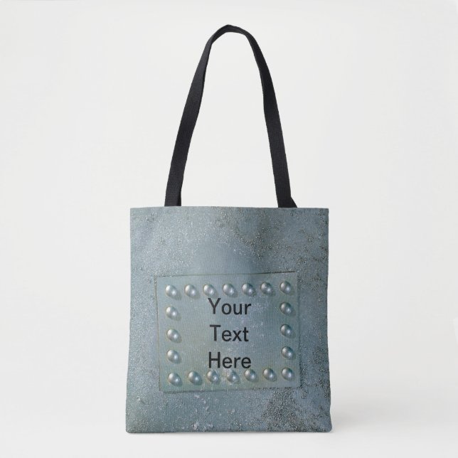 Grey metal with text plate on tote bag (Front)