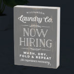 Grey Now Hiring Personalised Laundry Room Wooden Box Sign<br><div class="desc">Hang this personalised wood block in your laundry room and bring a little bit of that rustic farmhouse vibe to your home decor. Use the customise options to create a truly one of a kind print for yourself by changing the name font and the background colour from dark grey to...</div>