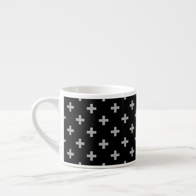 Grey polka crosses on black espresso cup (Left)