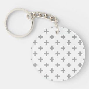 Grey polka crosses on white key ring