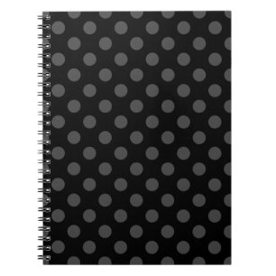 Grey polka dots on black notebook