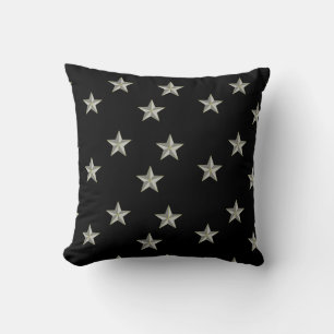 Grey stars pattern on black cushion