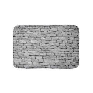 Grey stone wall, abstract background. bath mat