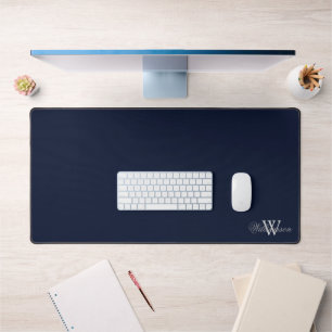 Grey Surname Over Pale Grey Monogram on Deep Blue Desk Mat