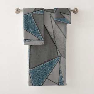 Grey triangle cutouts with rough dark blue pieces bath towel set