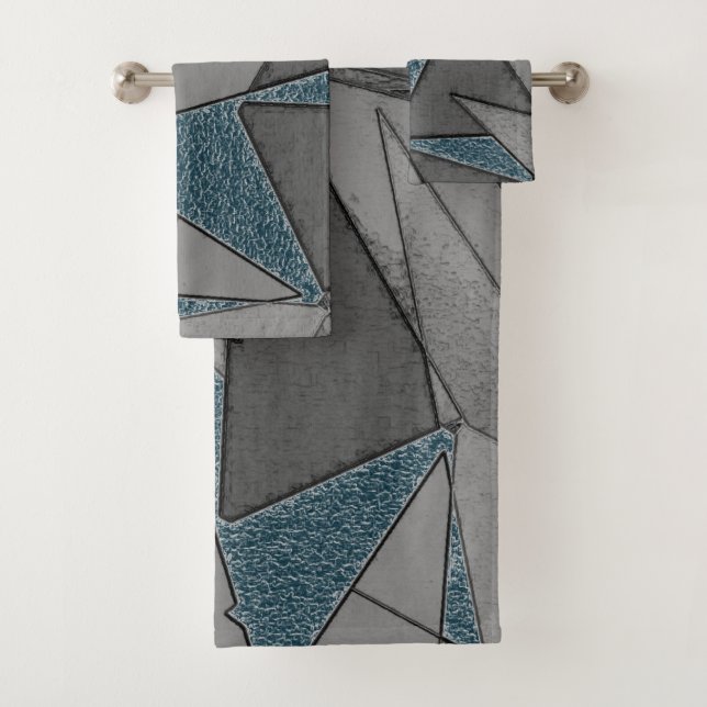 Grey triangle cutouts with rough dark blue pieces bath towel set (Insitu)