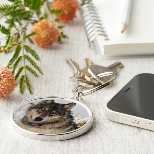 Grey Wolf or Timber Wolf Laying in the Snow Key Ring (Side)