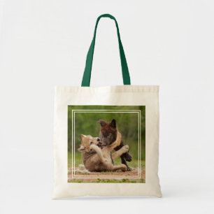 Grey Wolf Pups Wrestling Tote Bag