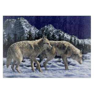 Grey Wolves in Snowy Winter Mountains Cutting Board