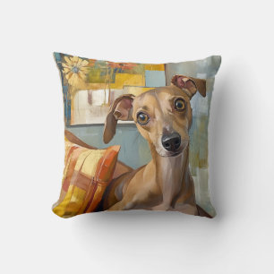 Greyhound on a sofa cushion