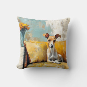 Greyhound on a sofa cushion