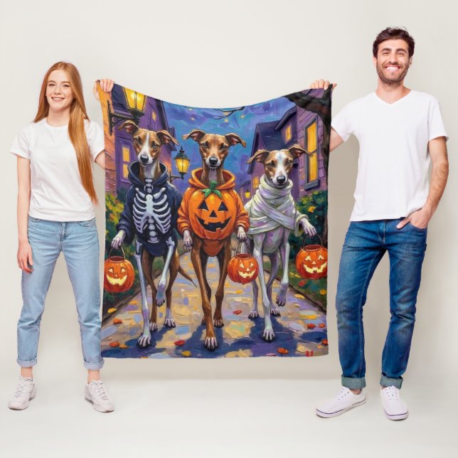 Greyhound Trick-or-Treating in Halloween Costumes Fleece Blanket (In Situ)