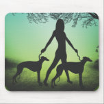 Greyhounds - Lady Walking Greyhounds Mouse Mat<br><div class="desc">Silhouette of lady walking two greyhounds at dusk with blue,  green and black colours.</div>