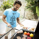 Grill On T-Shirt<br><div class="desc">Light blue basic t-shirt with “Keep Calm and Grill On” in bold black letters topped with barbeque utensils and a hotdog. See the entire Father's Day Apparel collection in the SPECIAL TOUCHES | Party Favours section.</div>