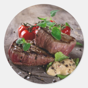 Grilled bbq steaks with fresh herbs and tomatoes classic round sticker