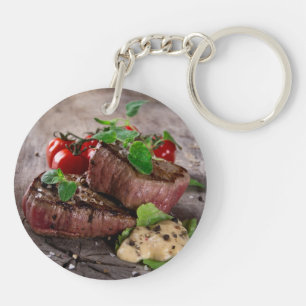 Grilled bbq steaks with fresh herbs and tomatoes key ring
