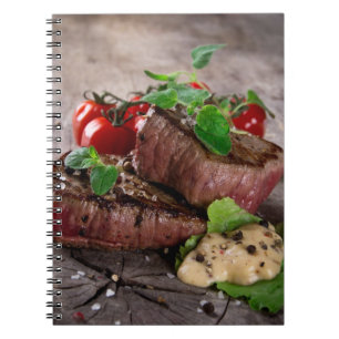 Grilled bbq steaks with fresh herbs and tomatoes notebook