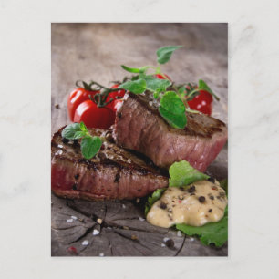 Grilled bbq steaks with fresh herbs and tomatoes postcard
