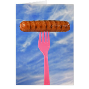 grilled hot dog on fork